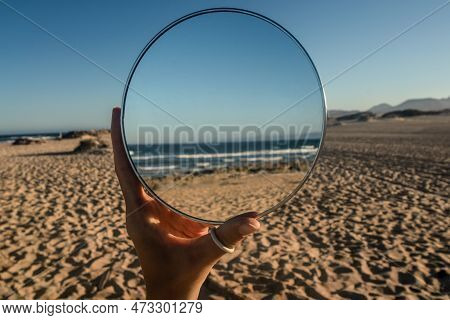 Conceptual Photo Of Beautiful Ocean Coast With The Sandy Beach In The Mirror Reflection. Dream. Natu