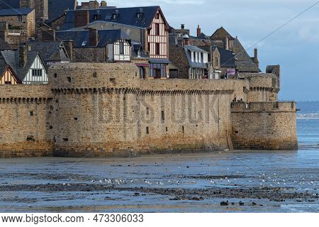 Mont Saint-michel, France, September 28, 2019 : The Mont Saint-michel Abbey Ramparts In Morning Ligh
