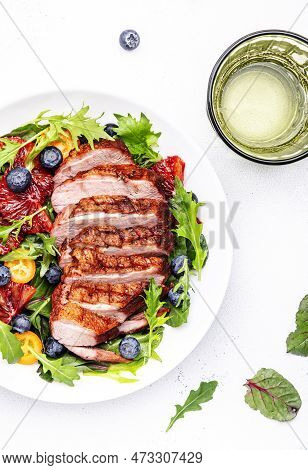 Duck Slices Salad With Grilled Breast And Bloody Orange, Kumquat, Blueberry And Chard, Frisse, Mizun