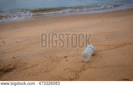 The Plastic Bottle Waste On The Beach, Bad Environment From Human, Dirty Sand And Sea On The Beach O