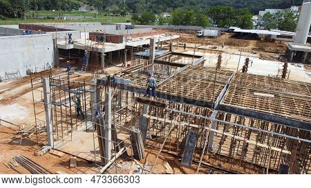 Ilheus, Bahia, Brazil - October 7, 2022: Workers During Construction Of A Polyclinic Of The Estada D