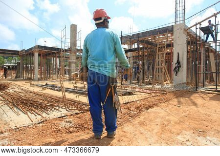 Ilheus, Bahia, Brazil - October 7, 2022: Workers During Construction Of A Polyclinic Of The Estada D