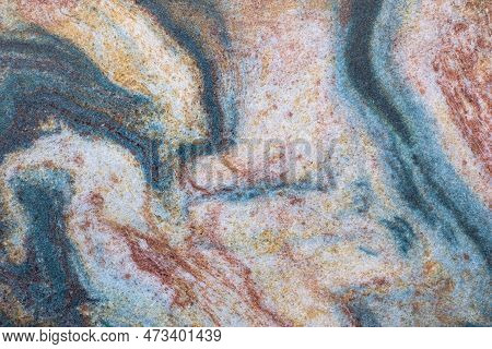 Clse View Of Mixed Colors Pattern Of A Qurtzite Stone Surface. Fullframe For A Backdrop.