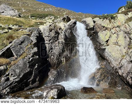 Mountain Waterfalls And Cascades Of Alpine Stream Ova Da Radönt (ova Da Radoent) Above The Swiss Roa