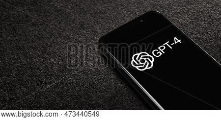 Gpt-4 Logo On Screen Smartphone On Black Textured Background. Gpt-4 Is A Chatbot By Openai. Moscow, 