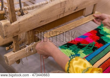 Perm, Russia - February 22, 2023: Tapestry Weaving Process On A Traditional Wooden Handloom