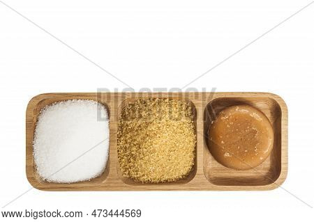 White Sugar, Brown Sugar And Sugar Cane Panela On White Background