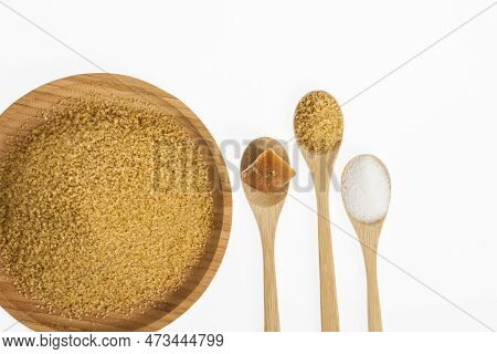 White Sugar, Brown Sugar And Sugar Cane Panela On White Background