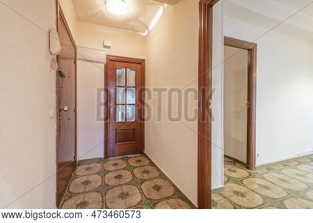 Entrance Hall Of An Urban Residential House With Armored Doors With Sapele Panels And Access Doors T