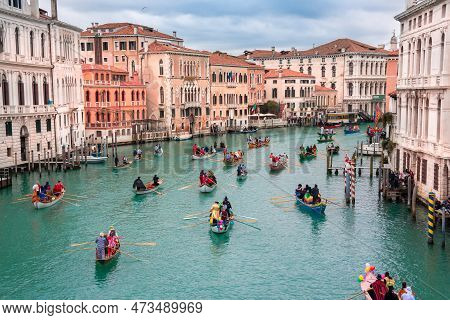 Venice, Italy, Grand Canal. Venice Carnival Opening With Gondola Boat Water Parade