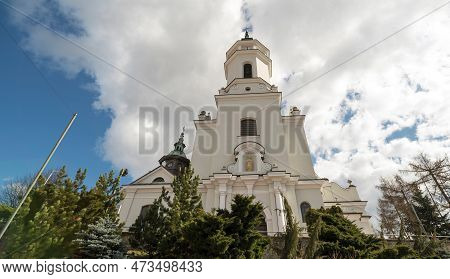A Historic, Old Church In Ostrowiec Swietokrzyski .the Collegiate Church Of Saint Michael The Archan