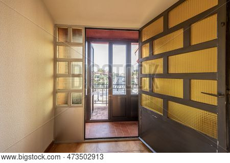 Aluminum Doors With Translucent Glass With An Antechamber With Doors Of The Same Material With Acces