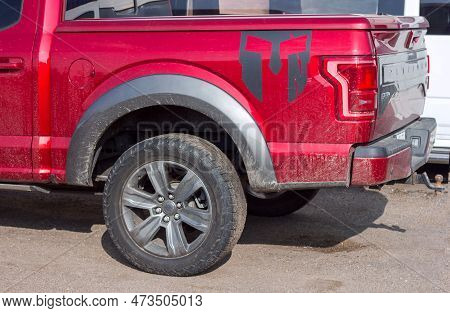 Lviv, Ukraine - 12 24 2022: Red Display Of Ford F-150 In A Car Dealership. Ford F150 Available In Pl
