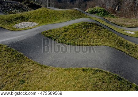 Bike Path In The Car Park Pumping (moving Up And Down) Is Used Instead Of Pedaling And Bouncing To M