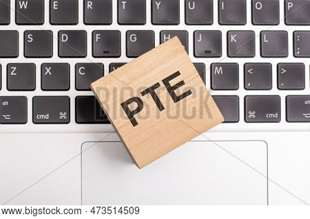 Pte Inscription Concept On Wooden Block On Keyboard