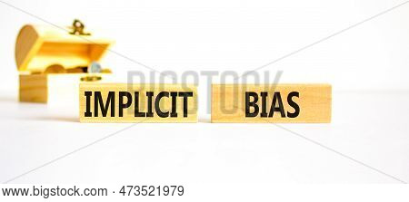 Implicit Bias Symbol. Concept Words Implicit Bias On Wooden Block. Beautiful White Table White Backg