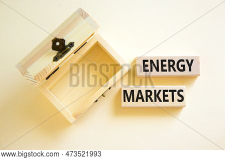 Energy Markets Symbol. Concept Words Energy Markets On Wooden Block. Beautiful White Table White Bac