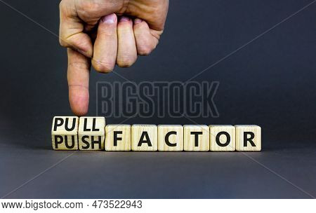 Pull Or Push Factor Symbol. Concept Word Pull Factor And Push Factor On Wooden Cubes. Beautiful Grey