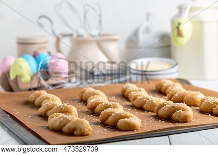 Festive Easter Greek Cookies Kuururakya With Sesame Seeds On A Baking Sheet Covered With Parchment, 