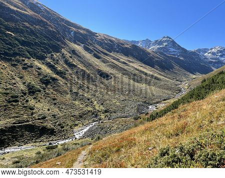 Beautiful Autumn Panorama Of The Alpine Valley Val Grialetsch And The Stream Aua Da Grialetsch In Th