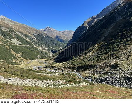 Beautiful Autumn Panorama Of The Alpine Valley Val Grialetsch And The Stream Aua Da Grialetsch In Th