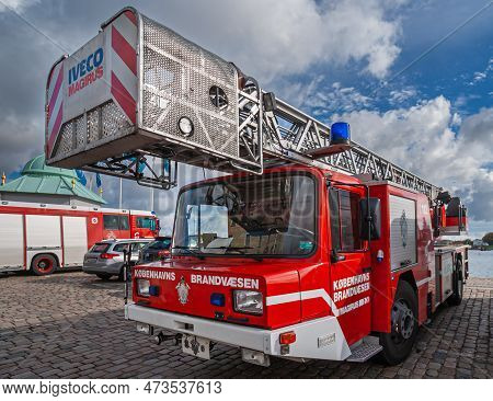 Copenhagen, Denmark - September 13, 2010: Red And White Ladder Fire Truck Parked On Harbor Quay With
