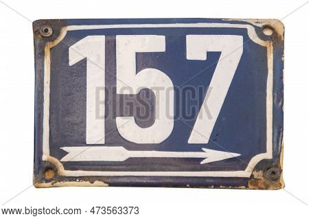 Weathered Grunge Square Metal Enameled Plate Of Number Of Street Address With Number 157 Isolated On