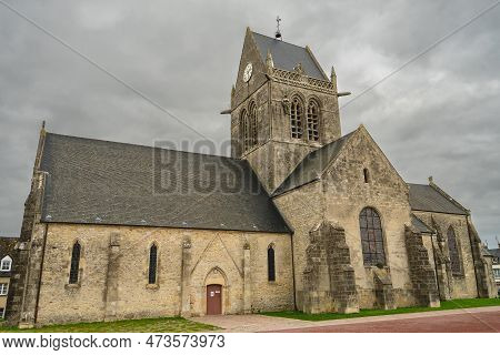 The Church Of Saint Mere Englise. Were The Paratrooper John Steele Of The 82nd Airborne Landed On Th