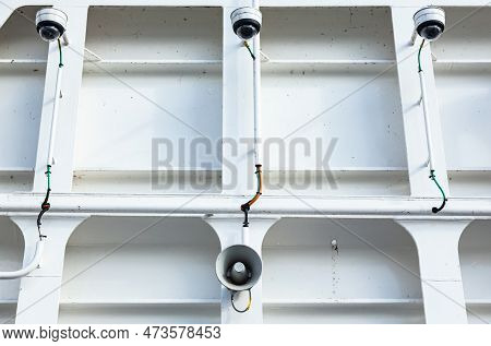 Surveillance Camera And A Loudspeaker On The Bulkhead Of The Ship\'s Hull.