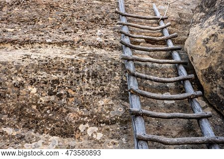 Wooden Ladder Leans Against Cliff Wall In Mesa Verde National Park