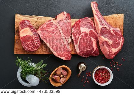 Raw Prime Steaks. Variety Of Fresh Black Angus Prime Meat Steaks T-bone, New York, Ribeye, Striploin