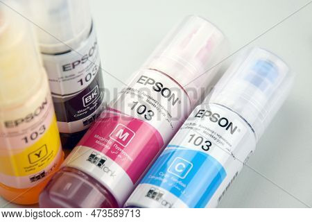 Four Bottles Of Ink Epson, Yellow, Red, Blue, Black, Built-in To The Epson L3150 Series Printer.