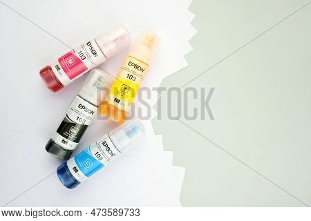 Four Bottles Of Ink Epson, Yellow, Red, Blue, Black, Built-in To The Epson L3150 Series Printer.