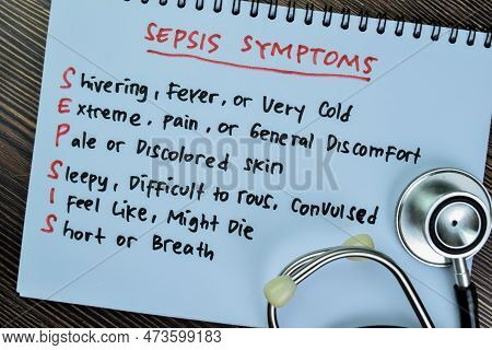 Concept Of Sepsis Symptoms Write On Book Isolated On Wooden Table.