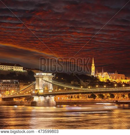 Amazing Night Scene With Traffic On Széchenyi Chain Bridge Over Danube River. Location: Budapest Cit