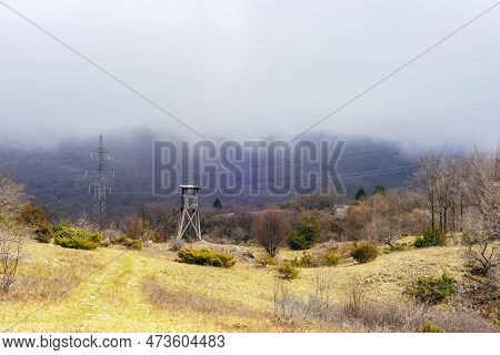 Hunting Tower In The Foggy Mountains. Ucka Nature Park, Croatia.