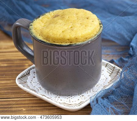 Vanilla Mugcake Is Microwaved. Homemade Cupcake In A Coffee Mug.