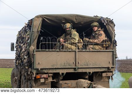 Donetsk Reg, Ukraine - Mar. 21, 2023: The Artillery Crew Leaves The Firing Position And Moves To A N