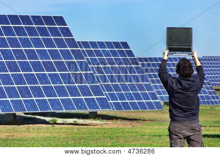 Young Man In Central Of Photovoltaic.