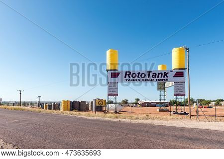 Upington, South Africa - Feb 25, 2023: A Road Scene, With A Water Tank Retailer On Road N14 Near Upi