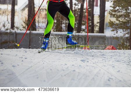 Zlatoust, Russia - March 17 2019: Male Skier Running Uphill In Cross-country Skiing, Fischer Racing 