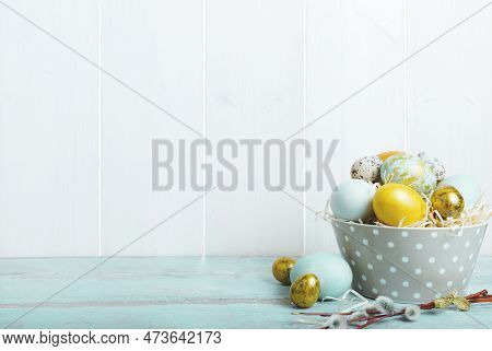 Easter Background With Easter Eggs And Spring Flowers.