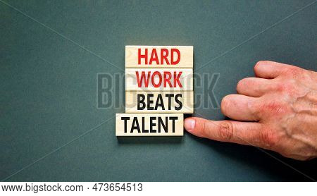 Hard Work Beats Talent Symbol. Concept Words Hard Work Beats Talent On Wooden Block. Beautiful Grey 