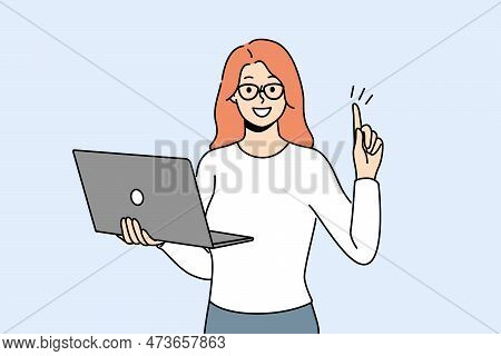 Smiling Businesswoman With Laptop In Hands Put Finger In Air Excited About Innovative Idea. Happy Wo