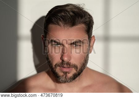 Close Up Portrait Of Half Naked Man 40s Having Bristle Isolated Over White Background. Handsome Seri
