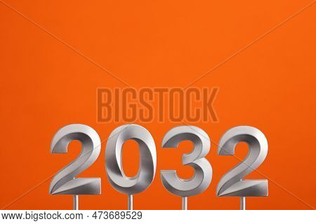 Year 2032 - Silver Number On Orange Foamy Background