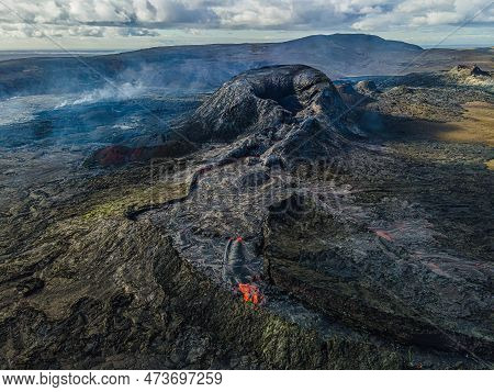 Top View Of Active Crater On Iceland's Reykjanes Peninsula. Landscape Of Cooled Lava Flow Around The