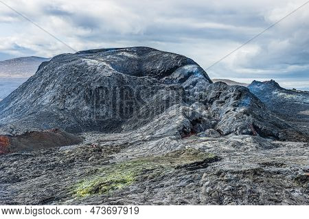 Cloudy Day With Volcanic Crater In Iceland. Landscape On The Reykjanes Peninsula. Crater With Cooled