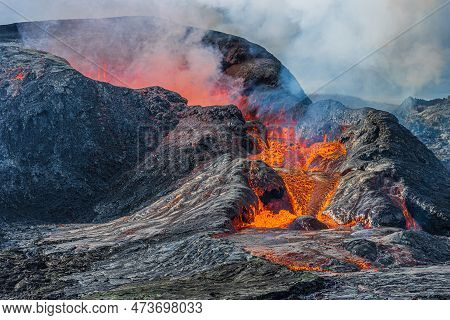 Details Of A Volcanic Crater Opening. Lava Flows In Small Amount From Crater. Active Volcano In Icel