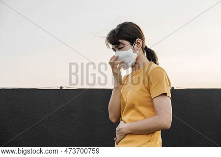Young Asian Woman Wearing N95 Respiratory Mask Protect And Filter Pm2.5 Or Particulate Matter Agains